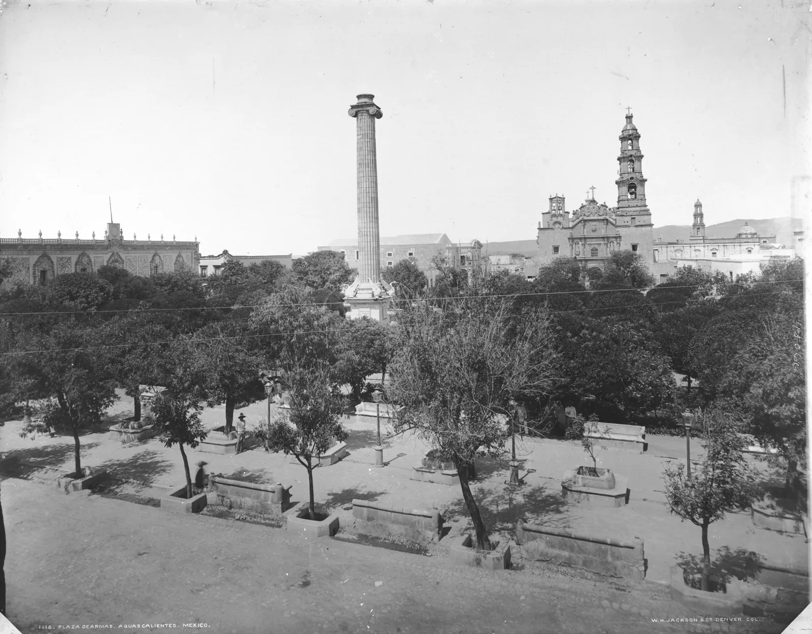 Plaza de Armas in Aguascalientes with the central column, the Government Palace and the cathedral